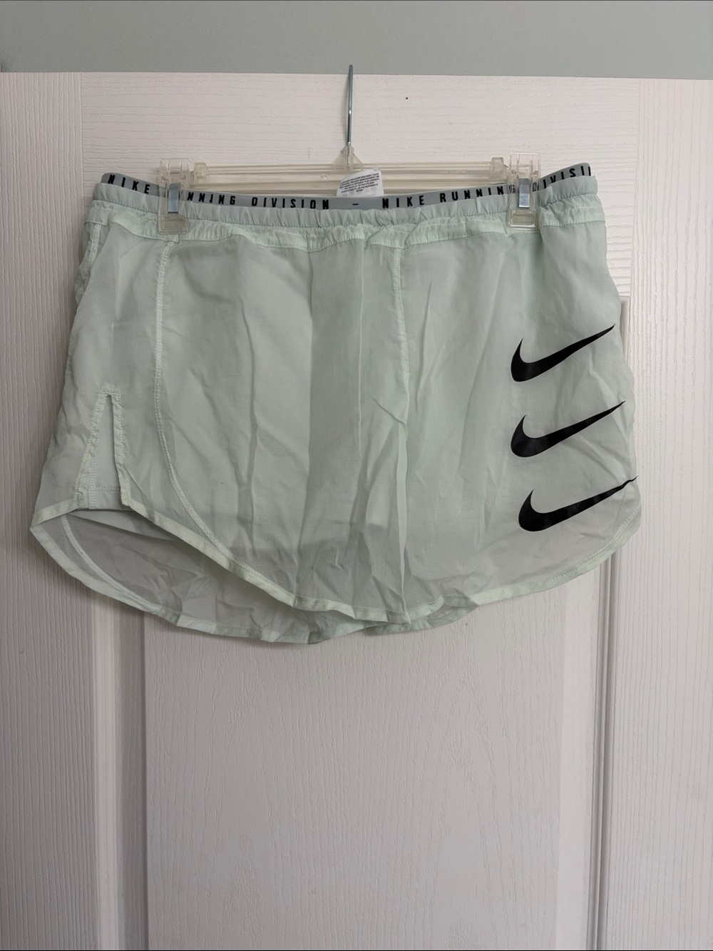 Nike Women’s Mint Green Running Shorts with Black Swooshes